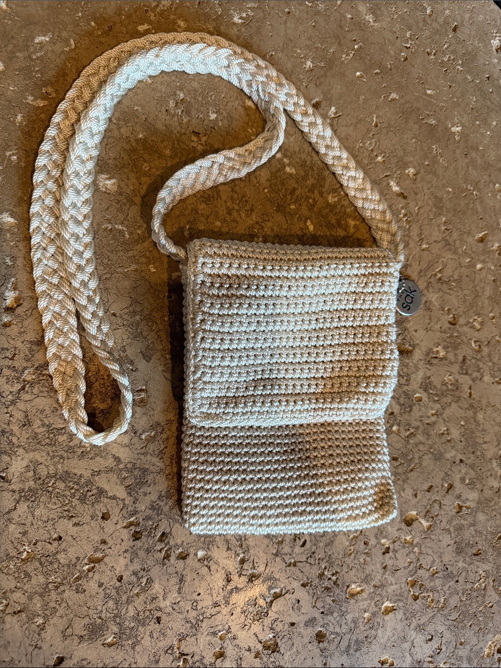 The Sak mini Crochet Cream Crossbody Bag with Braided Strap